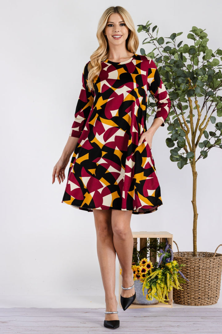 Celeste Full Size Geometric Round Neck Dress with Pockets | Trendsi