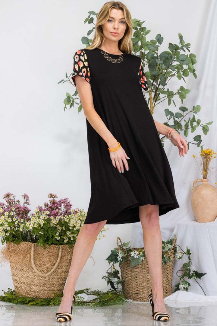 Celeste Full Size Leopard Short Sleeve Dress with Pockets | Trendsi