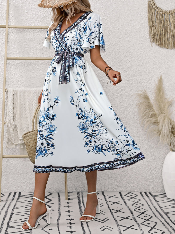 Printed Surplice Flutter Sleeve Dress | Trendsi