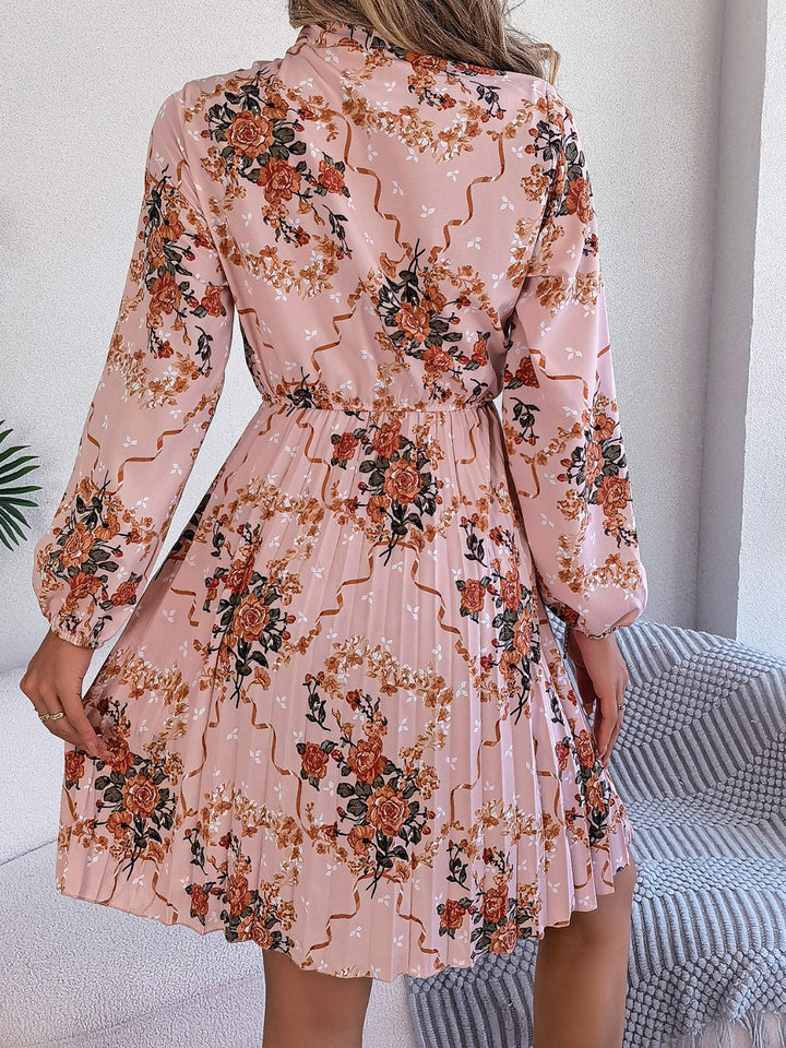 Pleated Printed Tie Neck Long Sleeve Dress | Trendsi