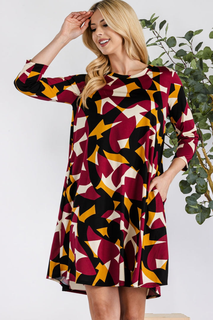 Celeste Full Size Geometric Round Neck Dress with Pockets | Trendsi