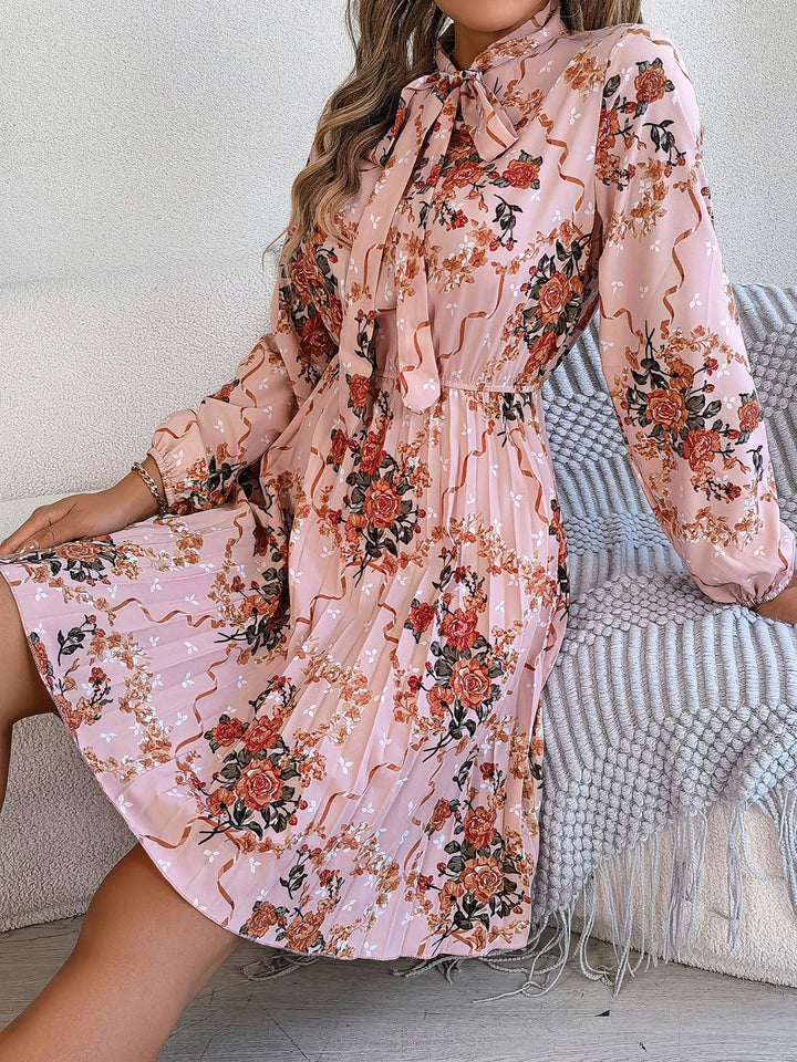 Pleated Printed Tie Neck Long Sleeve Dress | Trendsi