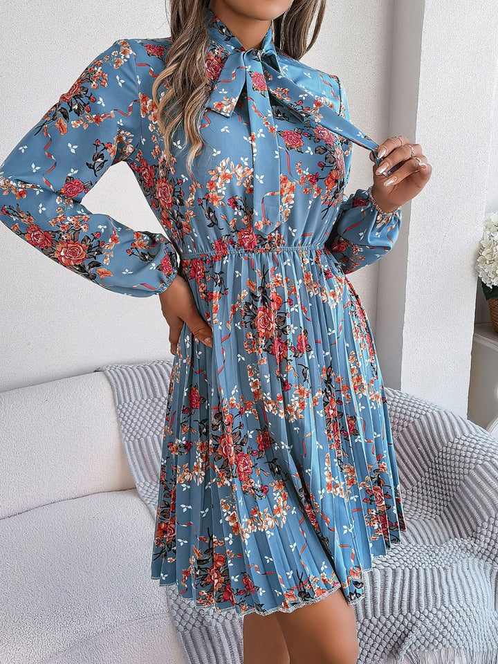 Pleated Printed Tie Neck Long Sleeve Dress | Trendsi