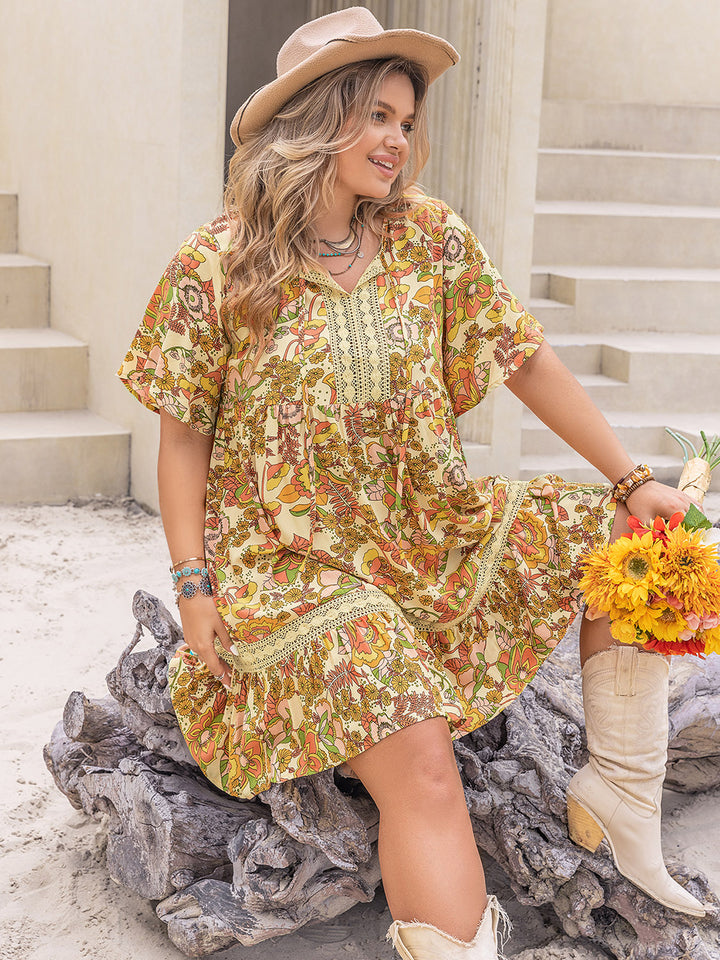 Plus Size Printed Tie Neck Short Sleeve Mini Dress | Trendsi