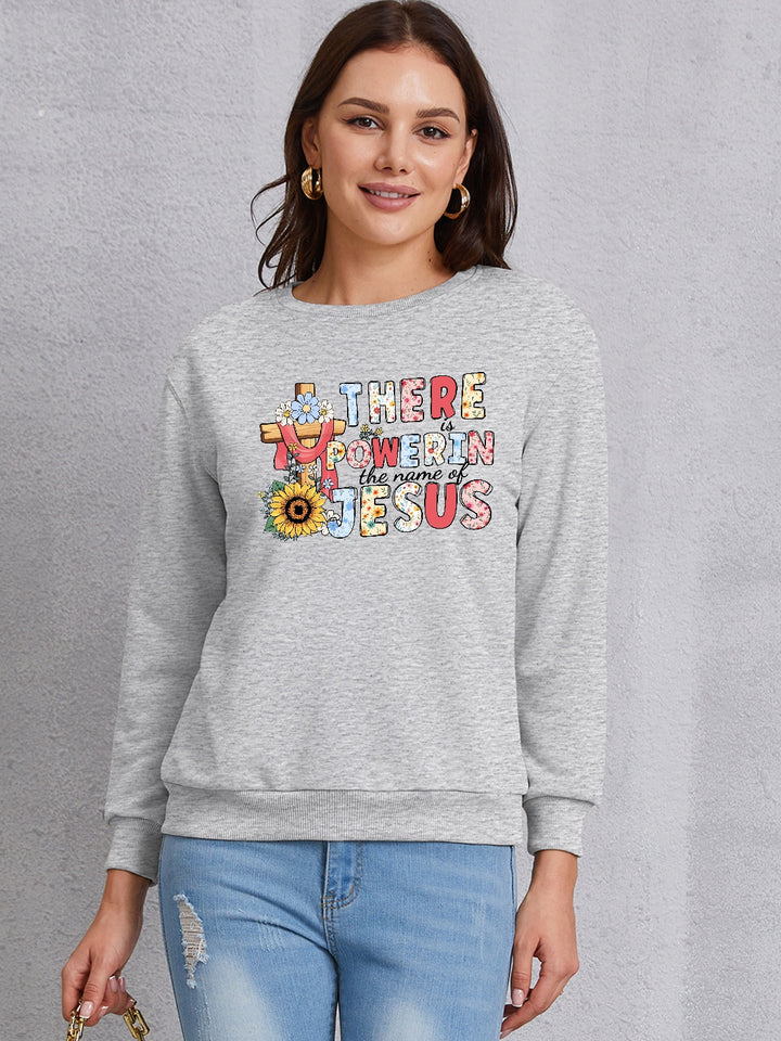 THERE IS POWER IN THE NAME OF JESUS Round Neck Sweatshirt | Trendsi