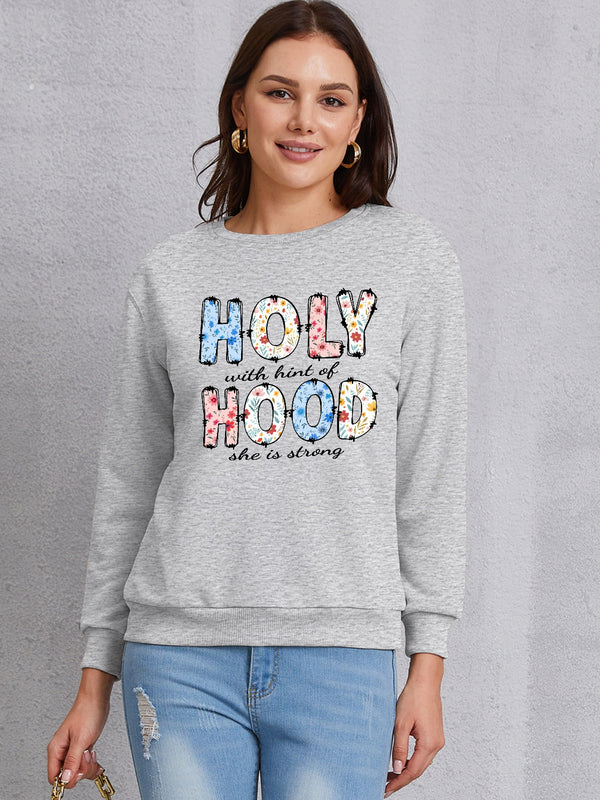 HOLY WITH HINT OF HOOD SHE IS STRONG Round Neck Sweatshirt | Trendsi