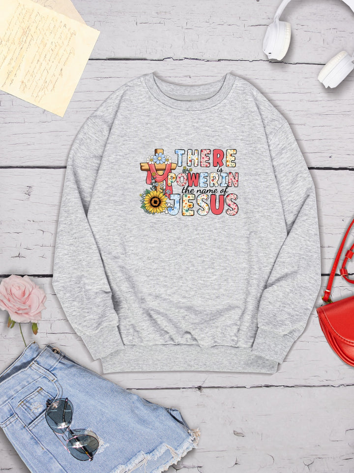 THERE IS POWER IN THE NAME OF JESUS Round Neck Sweatshirt | Trendsi