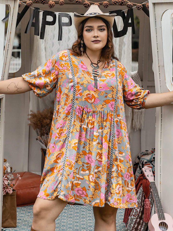 Plus Size Ruched Printed Half Sleeve Mini Dress | Trendsi