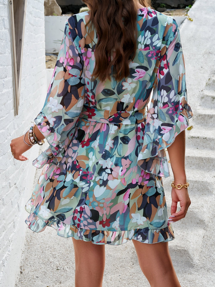 Ruffled Printed Surplice Half Sleeve Mini Dress | Trendsi