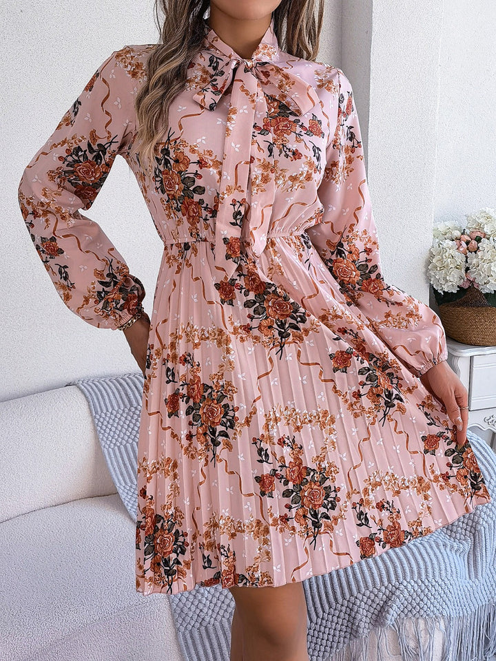 Pleated Printed Tie Neck Long Sleeve Dress | Trendsi