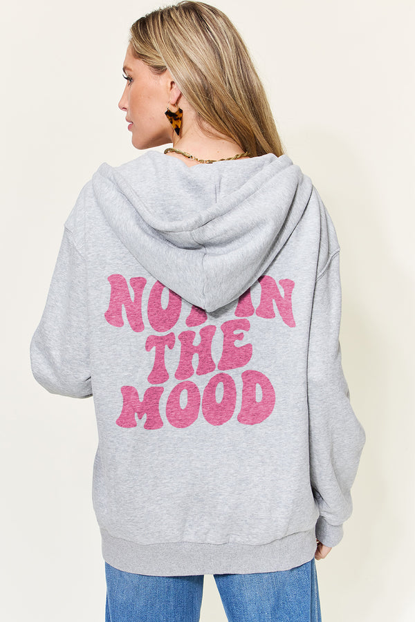 Simply Love Full Size NOT IN THE MOOD Graphic Zip-Up Hoodie with Pockets | Trendsi