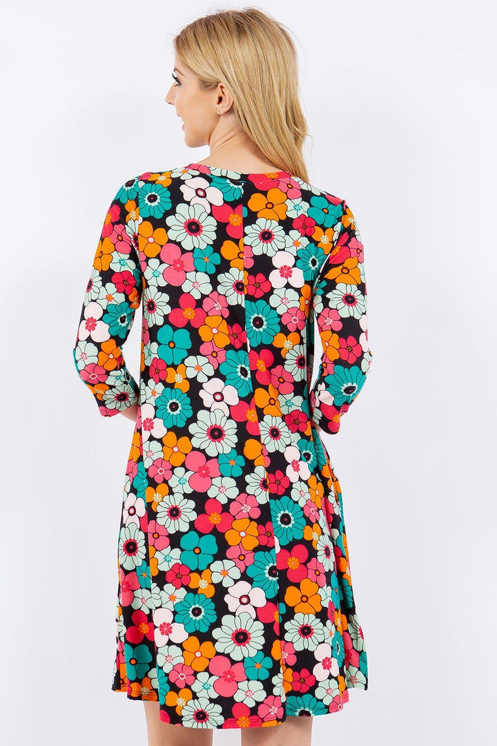 Celeste Full Size Floral Three-Quarter Sleeve Dress with Pockets | Trendsi