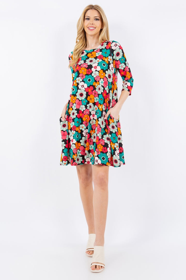 Celeste Full Size Floral Three-Quarter Sleeve Dress with Pockets | Trendsi