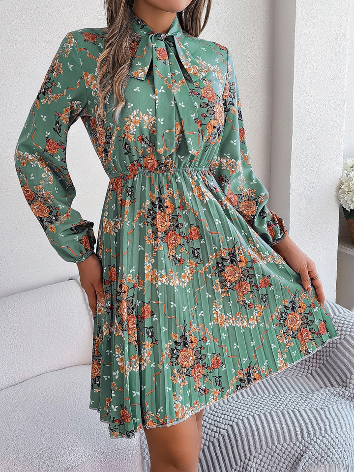 Pleated Printed Tie Neck Long Sleeve Dress | Trendsi