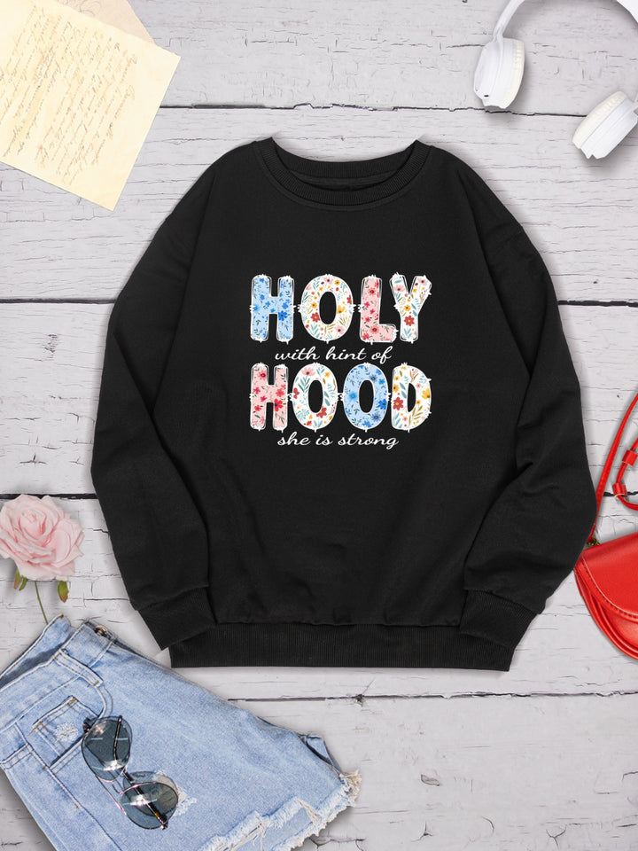 HOLY WITH HINT OF HOOD SHE IS STRONG Round Neck Sweatshirt | Trendsi