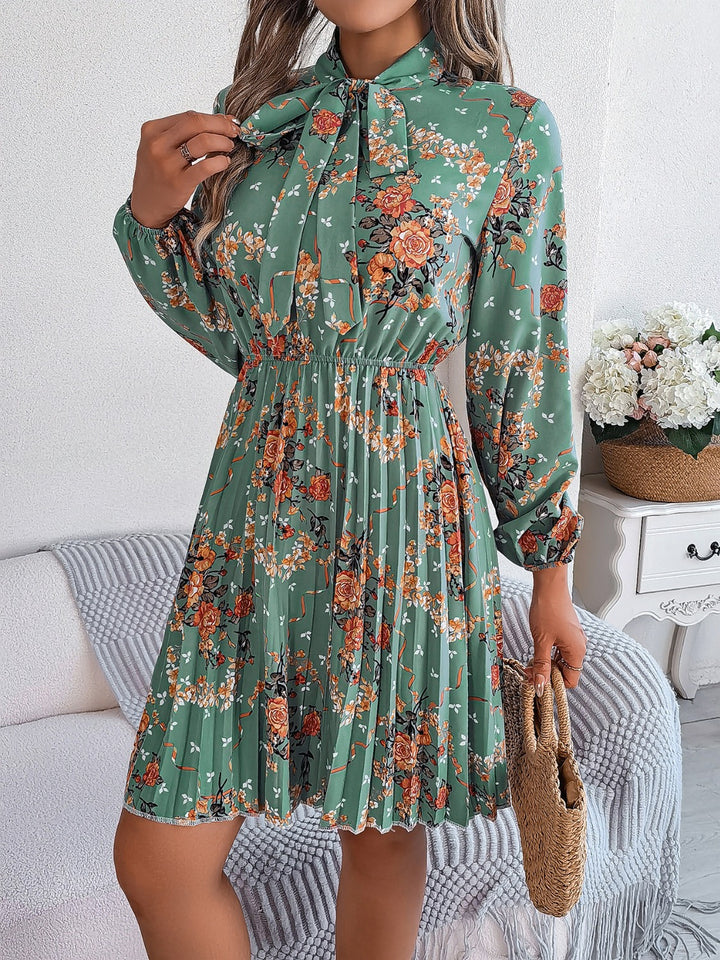 Pleated Printed Tie Neck Long Sleeve Dress | Trendsi