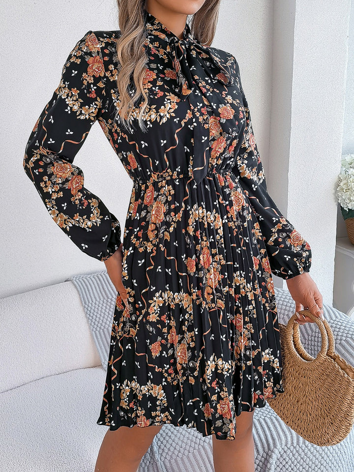 Pleated Printed Tie Neck Long Sleeve Dress | Trendsi