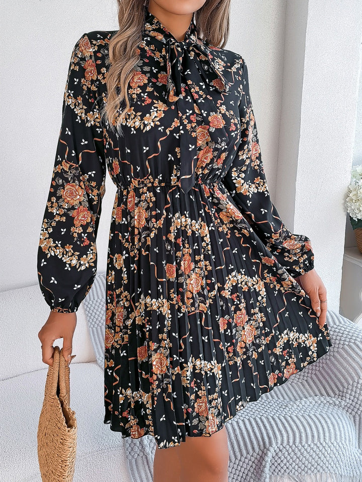 Pleated Printed Tie Neck Long Sleeve Dress | Trendsi