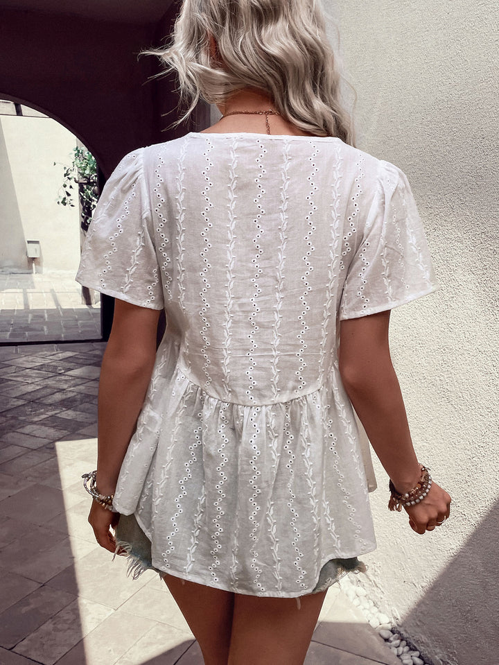 Perfee Tied Decorative Buttons Short Puff Sleeve Blouse | Trendsi