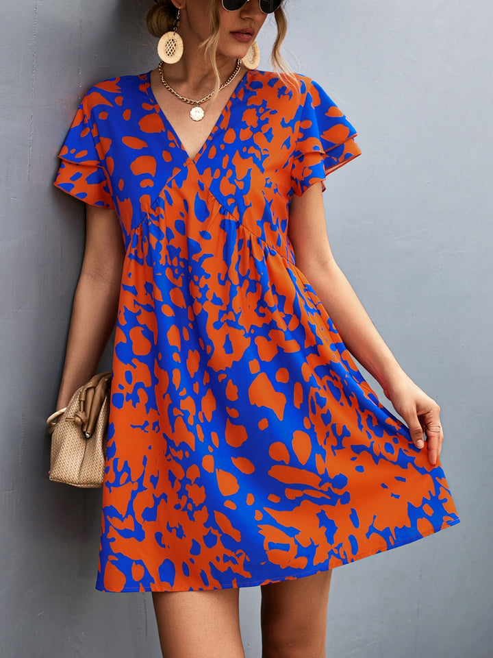 Ruffled Printed V-Neck Short Sleeve Mini Dress | Trendsi