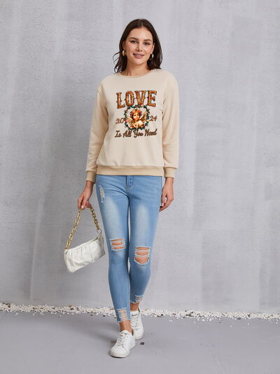 LOVE IS ALL YOU NEED Round Neck Sweatshirt | Trendsi