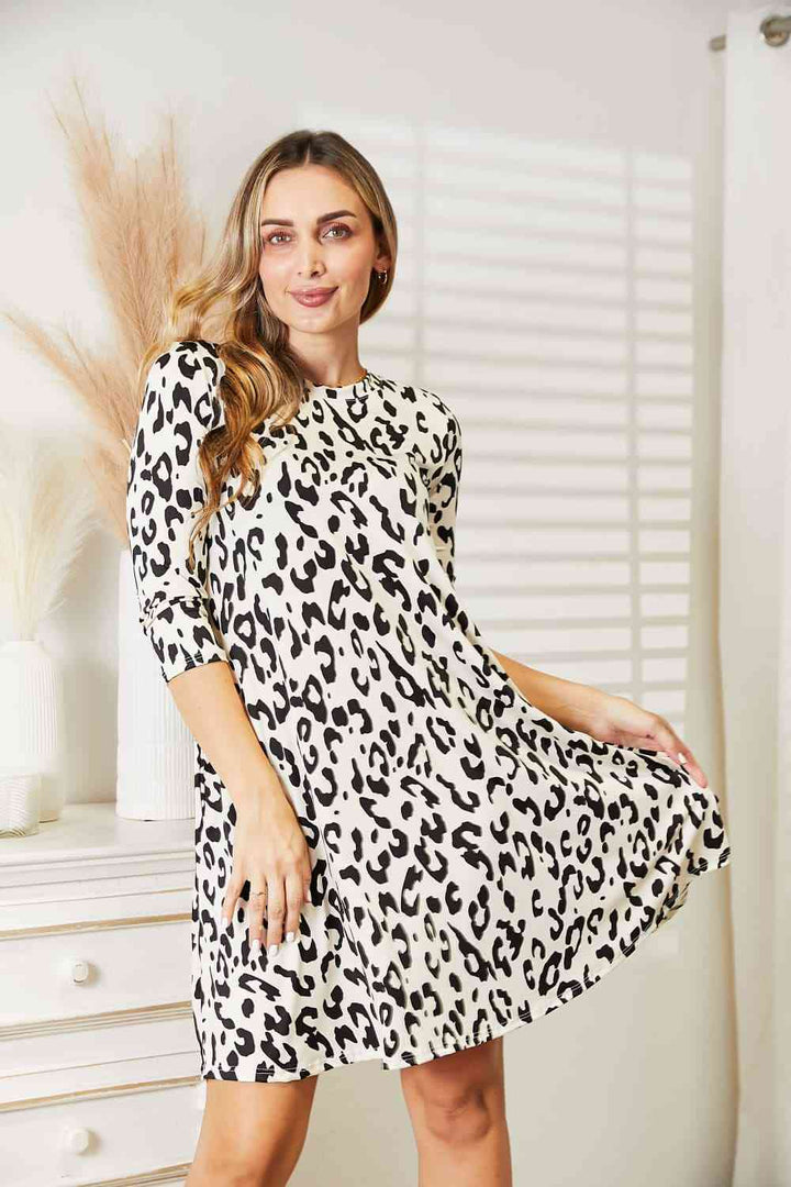 Celeste Full Size Leopard Three-Quarter Sleeve Dress with Pockets | 1mrk.com