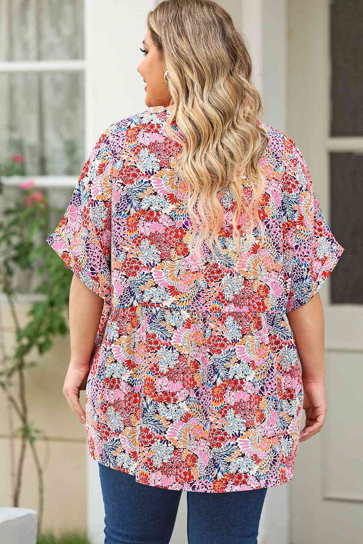 Plus Size Printed Notched Neck Half Sleeve Top | 1mrk.com