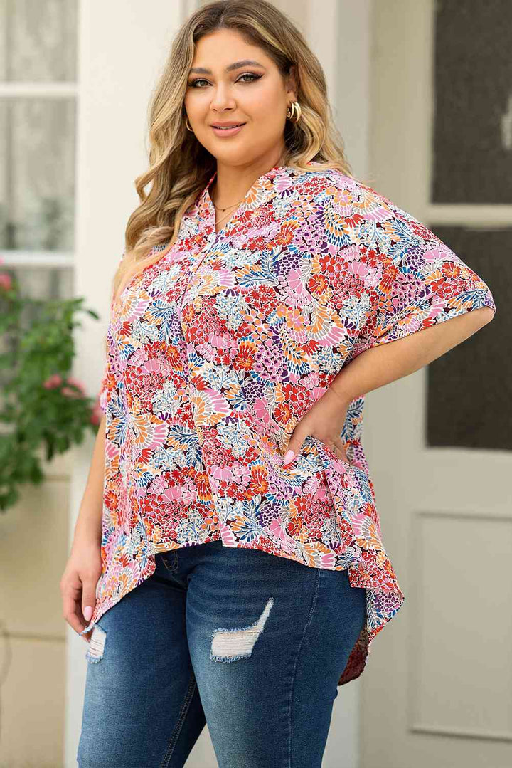 Plus Size Printed Notched Neck Half Sleeve Top | 1mrk.com