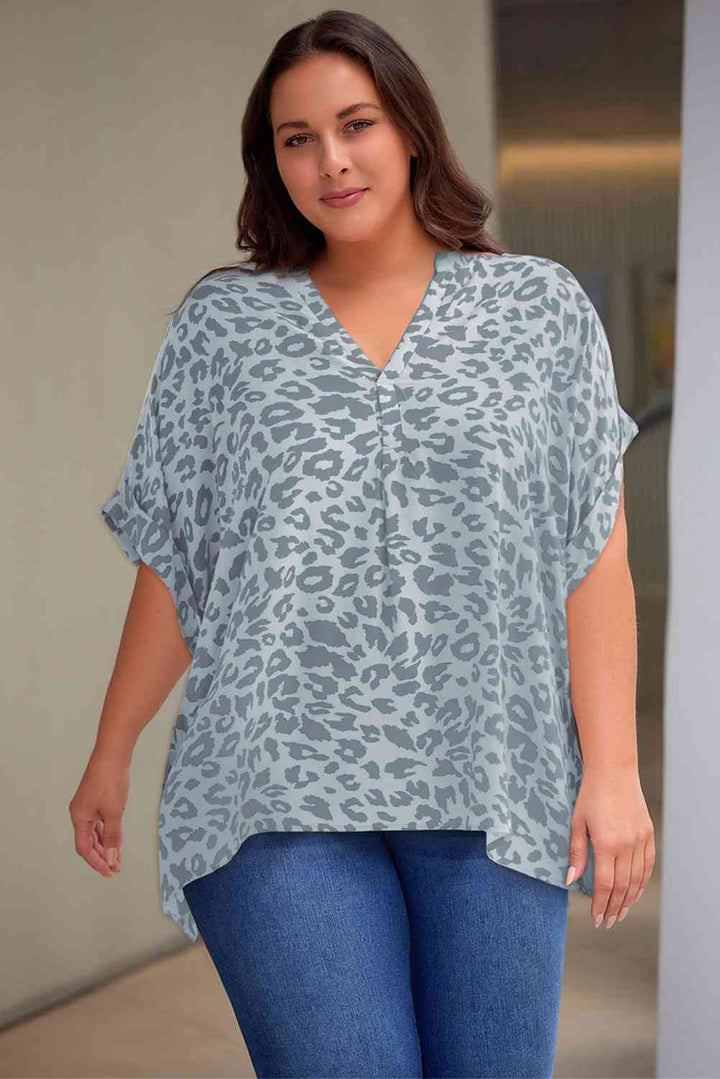 Plus Size Printed Notched Neck Half Sleeve Top | 1mrk.com