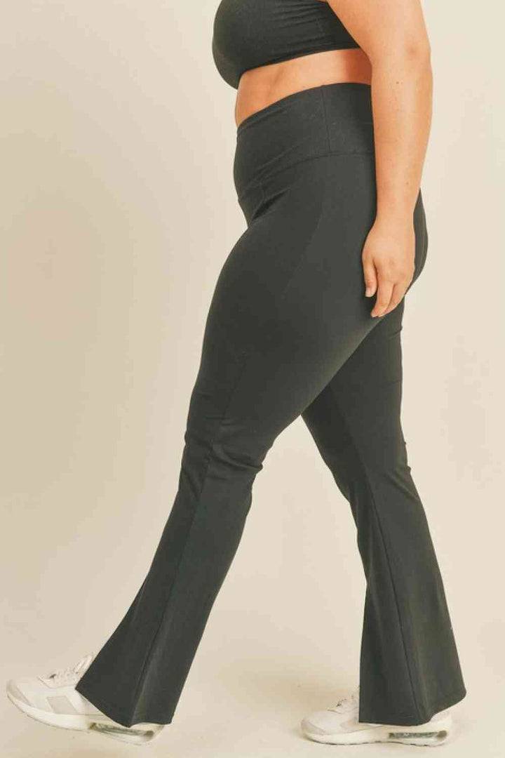Kimberly C Full Size Slit Flare Leg Pants in Black | 1mrk.com