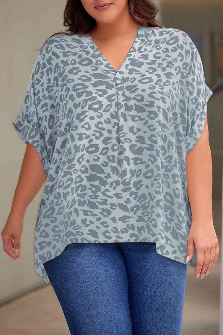 Plus Size Printed Notched Neck Half Sleeve Top | 1mrk.com