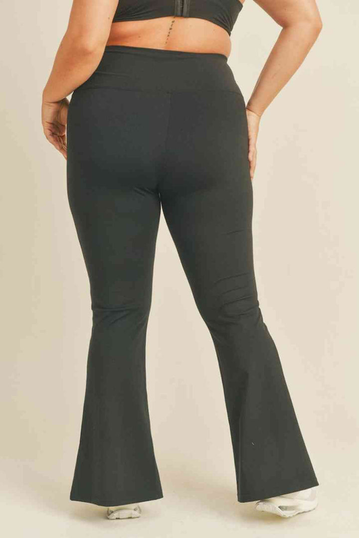Kimberly C Full Size Slit Flare Leg Pants in Black | 1mrk.com