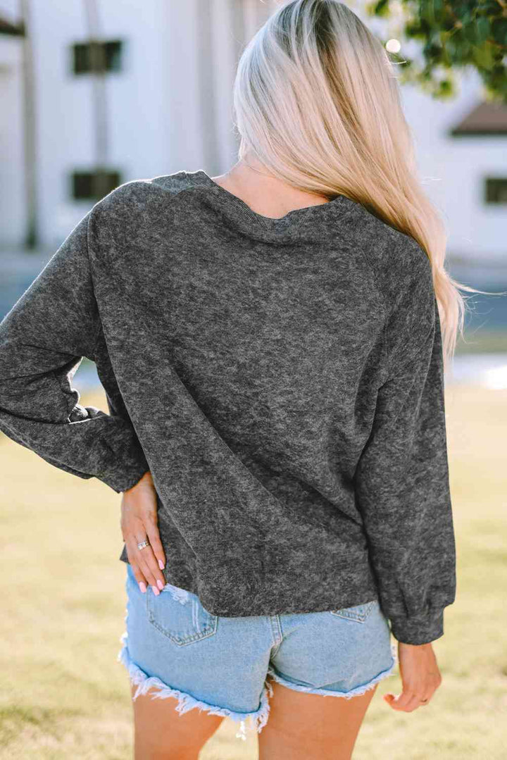 Mineral Washed COW'S FIRST RODEO Round Neck Raglan Sleeve Sweatshirt |1mrk.com