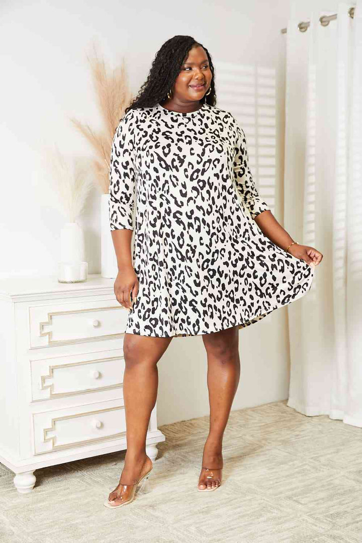 Celeste Full Size Leopard Three-Quarter Sleeve Dress with Pockets | 1mrk.com