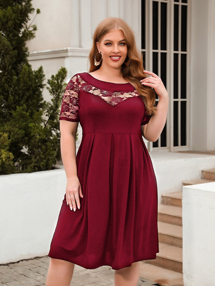 Plus Size Ruched Round Neck Short Sleeve Dress | Trendsi