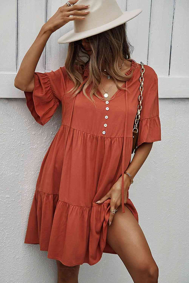 Buttoned Tie Neck Tiered Mini Dress |1mrk.com