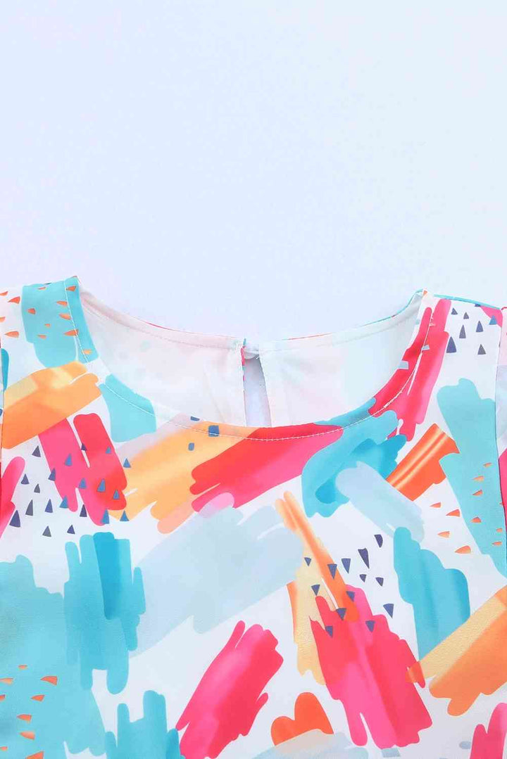 Printed Round Neck Ruffled Peplum Top | 1mrk.com