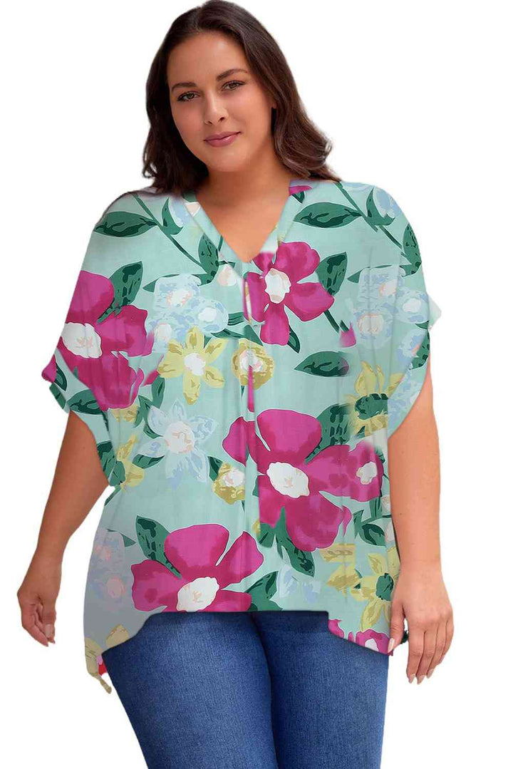 Plus Size Printed Notched Neck Half Sleeve Top | 1mrk.com