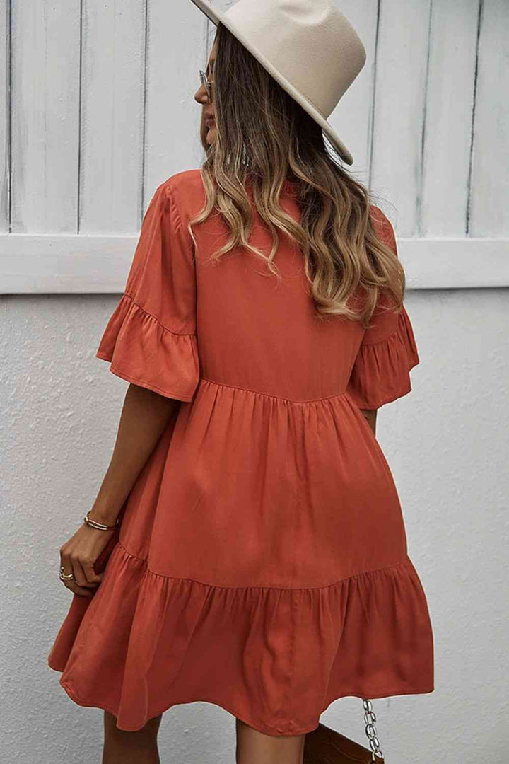 Buttoned Tie Neck Tiered Mini Dress |1mrk.com